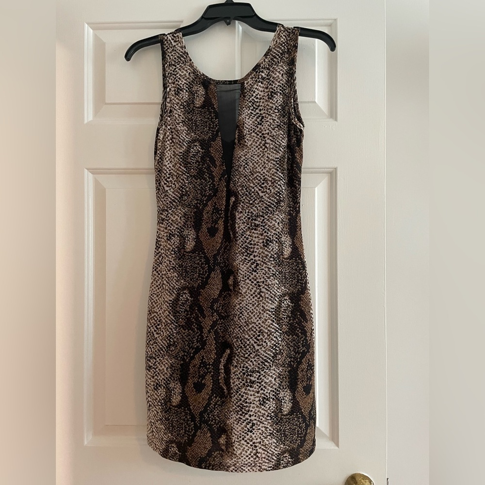Sexy night-out dress with snake skin pattern and sheer black plunging neckline